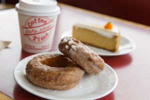 Cider Donut, sliced cake and a cup of coffee